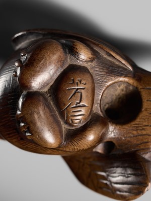 Lot 142 - YOSHINOBU: A RARE WOOD NETSUKE OF A BROODING SPARROW