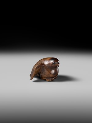 Lot 142 - YOSHINOBU: A RARE WOOD NETSUKE OF A BROODING SPARROW