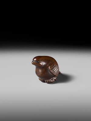 Lot 142 - YOSHINOBU: A RARE WOOD NETSUKE OF A BROODING SPARROW