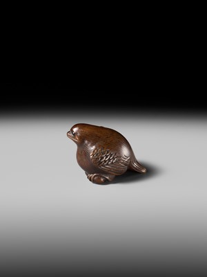Lot 142 - YOSHINOBU: A RARE WOOD NETSUKE OF A BROODING SPARROW
