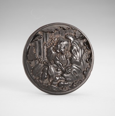 Lot 1790 - A PRESSED HORN MANJU NETSUKE OF MONGAKU SHONIN