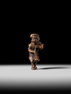 Lot 94 - A TALL WOOD NETSUKE OF A DUTCHMAN WITH CHILD