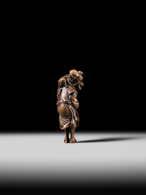 Lot 94 - A TALL WOOD NETSUKE OF A DUTCHMAN WITH CHILD