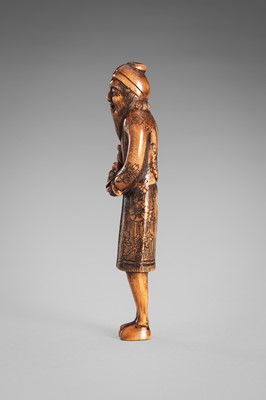 HARAMASA: A WOOD NETSUKE OF A FOREIGNER