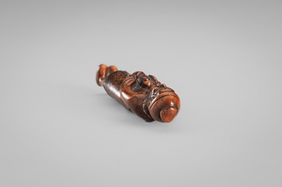 HARAMASA: A WOOD NETSUKE OF A FOREIGNER
