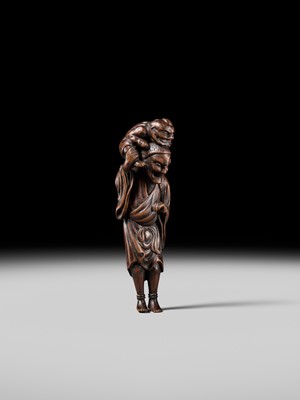 Lot 100 - A RARE WOOD NETSUKE OF A CHINESE IMMORTAL WITH AN ONI