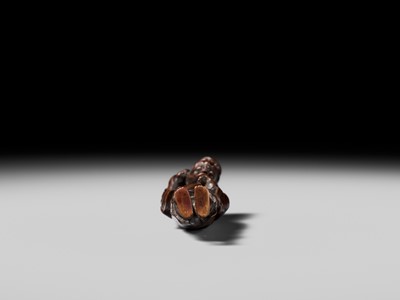 Lot 100 - A RARE WOOD NETSUKE OF A CHINESE IMMORTAL WITH AN ONI
