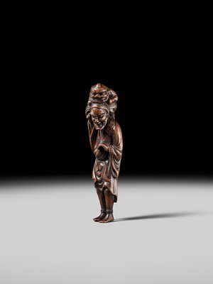 Lot 100 - A RARE WOOD NETSUKE OF A CHINESE IMMORTAL WITH AN ONI