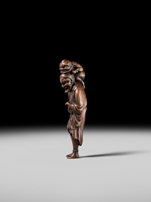 Lot 100 - A RARE WOOD NETSUKE OF A CHINESE IMMORTAL WITH AN ONI