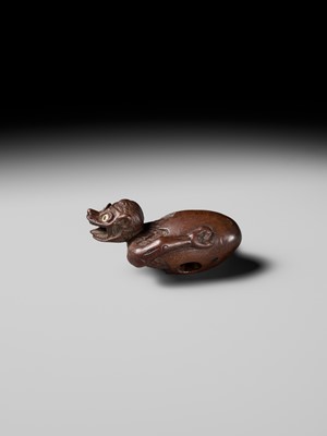 MINKO: A RARE AND UNUSUAL WOOD NETSUKE OF A HATCHING TENGU (TENGU NO TOMAGO)