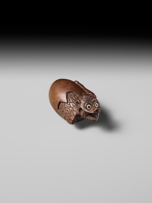 MINKO: A RARE AND UNUSUAL WOOD NETSUKE OF A HATCHING TENGU (TENGU NO TOMAGO)