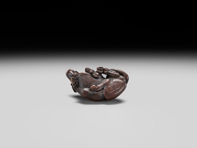 Lot 191 - ITTAN: A FINE WOOD NETSUKE OF A RECUMBENT OX