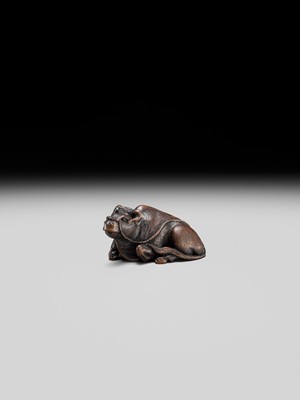 Lot 191 - ITTAN: A FINE WOOD NETSUKE OF A RECUMBENT OX