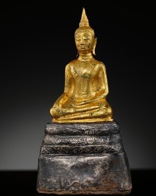 Lot 424 - A GOLD AND SILVER FOIL FIGURE OF BUDDHA SHAKYAMUNI, CIRCA 1400