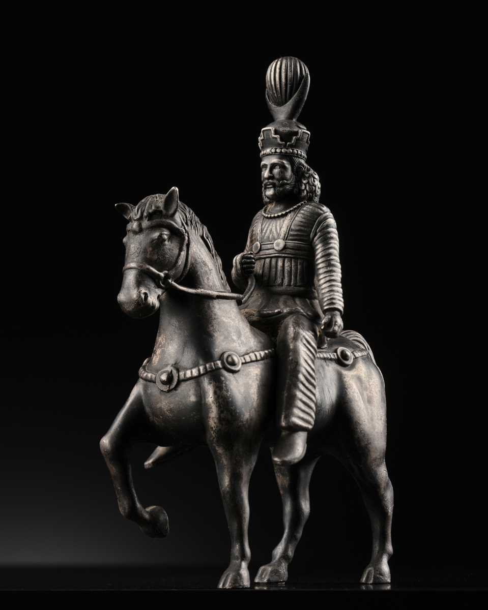 Lot 619 - A SILVER FIGURE OF A SASANIAN KING ON HORSEBACK, PERSIA, 19TH CENTURY OR EARLIER