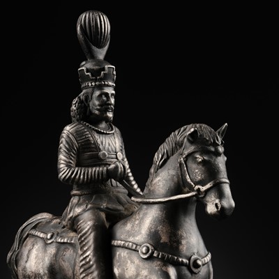 Lot 619 - A SILVER FIGURE OF A SASANIAN KING ON HORSEBACK, PERSIA, 19TH CENTURY OR EARLIER