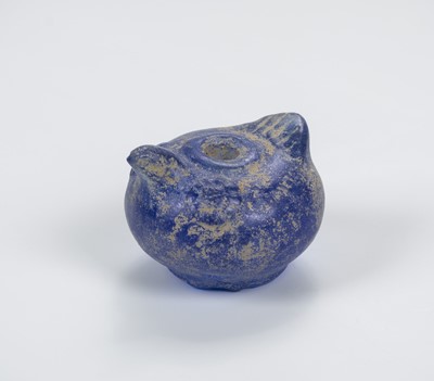 Lot 2080 - A DONG SON GLASS BEAD IN THE FORM OF A BIRD, c. 800 BC – 200 AD