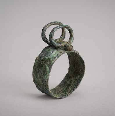 Lot 2107 - A BRONZE ‘BUFFALO HEAD’ RING, DONG SON CULTURE