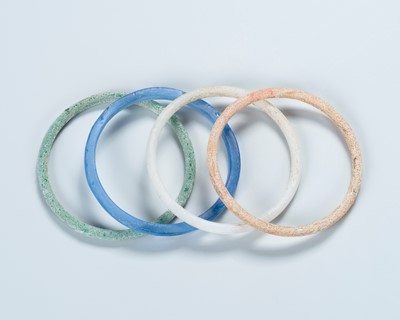 Lot 2081 - A GROUP OF FOUR ANCIENT GLASS BANGLES, 202 BC-220 AD