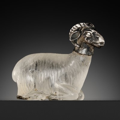 Lot 372 - A WESTERN ASIATIC SILVER AND ROCK CRYSTAL ‘RAM’ CARVING, 1ST MILLENNIUM BC