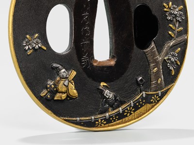 Lot 82 - GOTO DENJO: A FINE SHAKUDO NANAKO TSUBA WITH A SCENE FROM TALE OF GENJI
