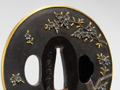 Lot 82 - GOTO DENJO: A FINE SHAKUDO NANAKO TSUBA WITH A SCENE FROM TALE OF GENJI