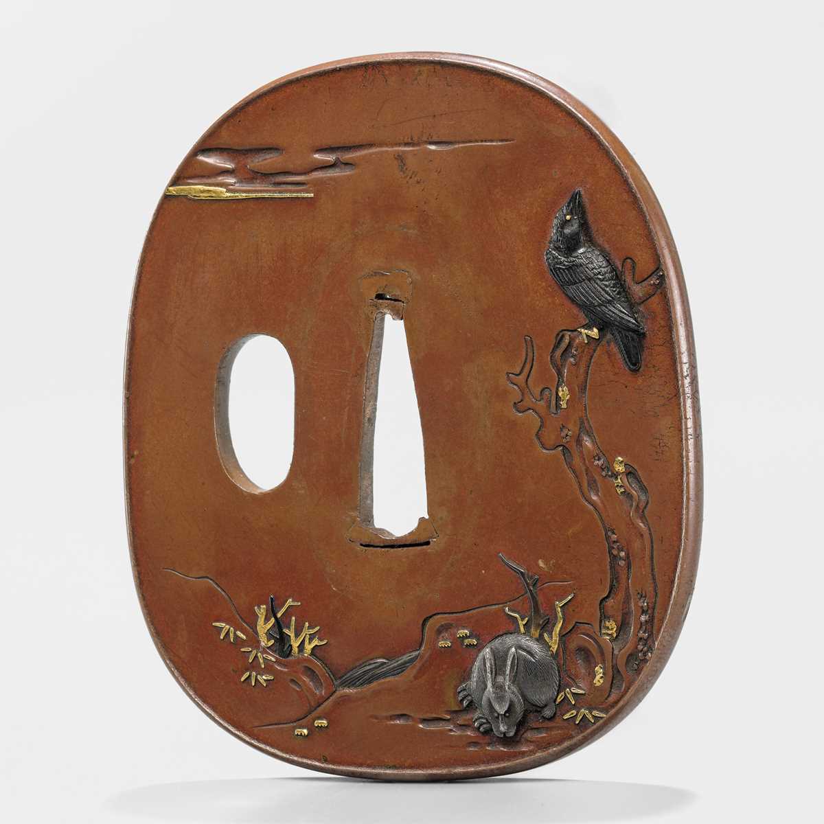 Lot 75 - TOMOTSUNE: A FINE NARA SCHOOL SUAKA TSUBA WITH A CROW AND RABBIT UNDER THE MOON