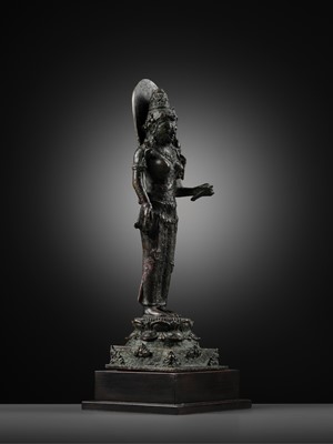 Lot 266 - A BRONZE FIGURE OF DEWI TARA, MAJAPAHIT PERIOD