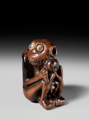 Lot 82 - A RARE AND UNUSUAL (TRICK) NETSUKE OF A MONKEY WITH YOUNG
