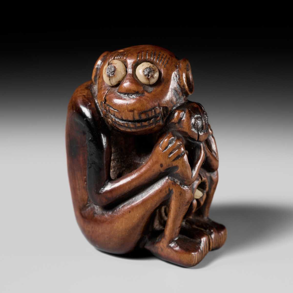 Lot 82 - A RARE AND UNUSUAL (TRICK) NETSUKE OF A MONKEY WITH YOUNG