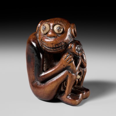 Lot 82 - A RARE AND UNUSUAL (TRICK) NETSUKE OF A MONKEY WITH YOUNG