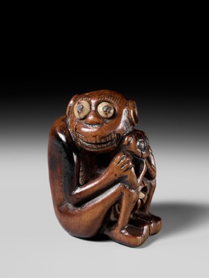 Lot 82 - A RARE AND UNUSUAL (TRICK) NETSUKE OF A MONKEY WITH YOUNG