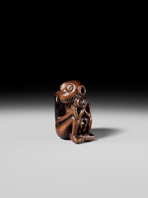 Lot 82 - A RARE AND UNUSUAL (TRICK) NETSUKE OF A MONKEY WITH YOUNG