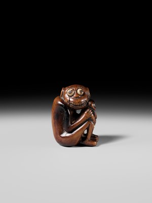 Lot 82 - A RARE AND UNUSUAL (TRICK) NETSUKE OF A MONKEY WITH YOUNG