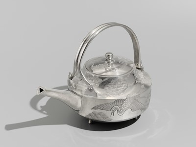 Lot 32 - A FINE SILVER ‘CRANE AND PINE’ SAKE EWER WITH LACQUER STAND