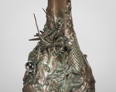 Lot 7 - AKASOFU GYOKKO: A BRONZE ‘DRAGON’ VASE WITH SMALL CRYSTAL SPHERE