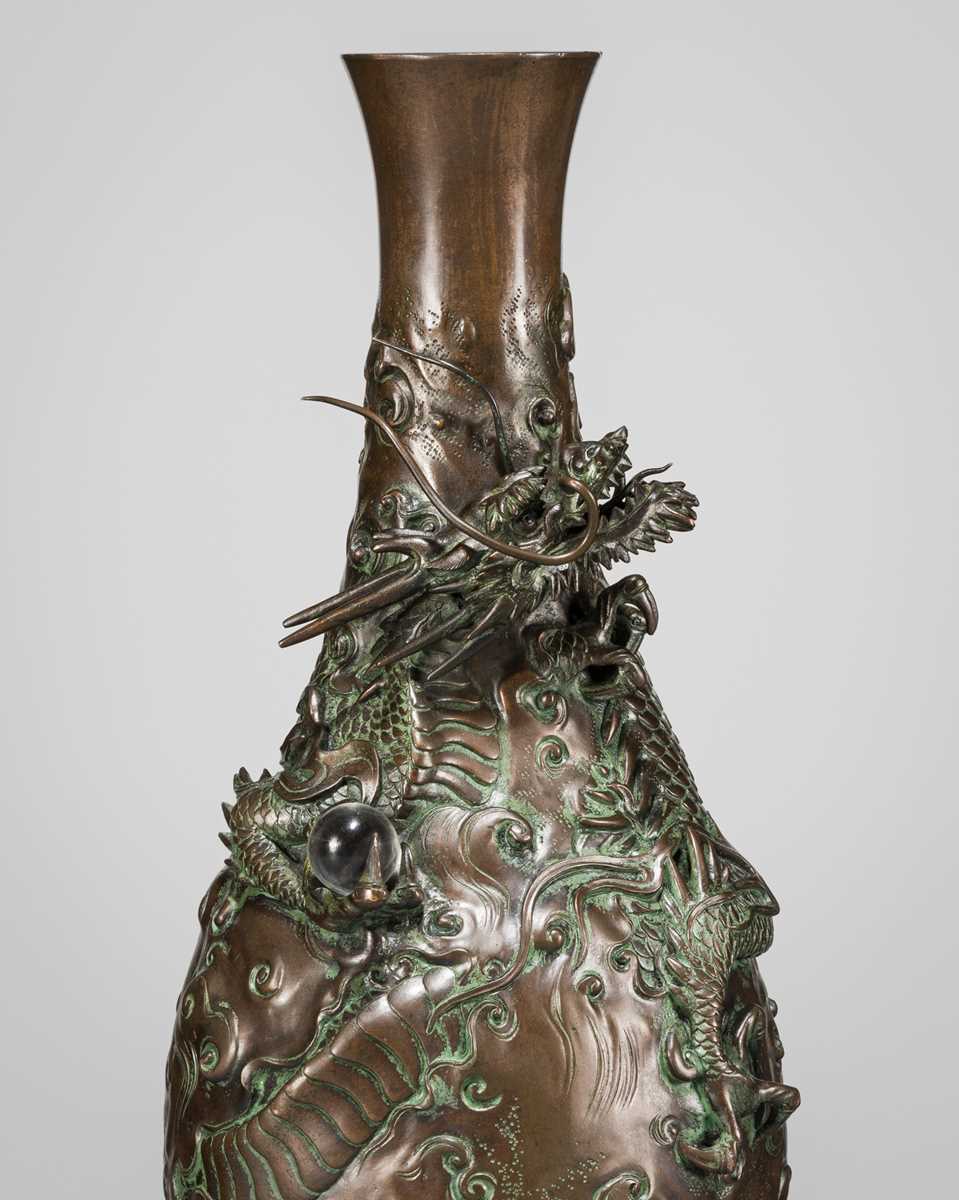 Lot 7 - AKASOFU GYOKKO: A BRONZE ‘DRAGON’ VASE WITH SMALL CRYSTAL SPHERE