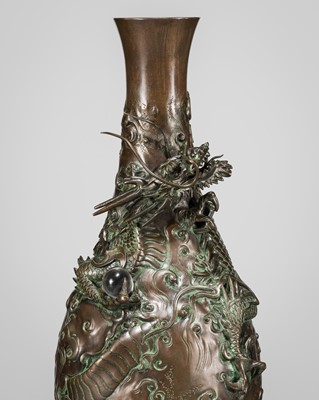 Lot 7 - AKASOFU GYOKKO: A BRONZE ‘DRAGON’ VASE WITH SMALL CRYSTAL SPHERE