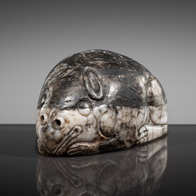 Lot 155 - A BLACK AND WHITE JADE ‘MYTHICAL BEAST’ PENDANT, MING DYNASTY