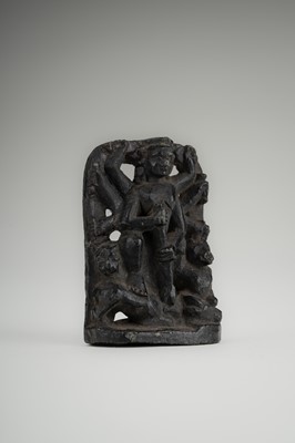 A SMALL STONE STELE OF DURGA SLAYING THE BUFFALO-DEMON MAHISHA, c. 16TH CENTURY