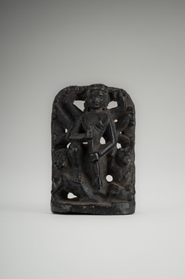A SMALL STONE STELE OF DURGA SLAYING THE BUFFALO-DEMON MAHISHA, c. 16TH CENTURY