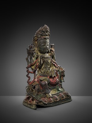 Lot 58 - A PAINTED BRONZE FIGURE OF MANJUSHRI ON A LION, MING DYNASTY