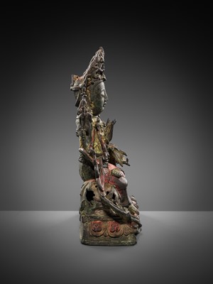 Lot 58 - A PAINTED BRONZE FIGURE OF MANJUSHRI ON A LION, MING DYNASTY
