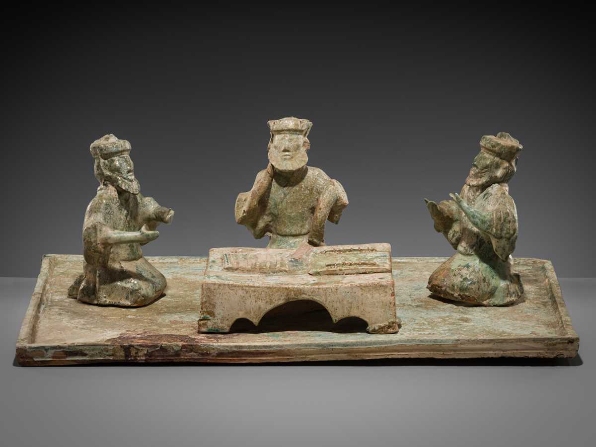 Lot 230 - AN EXCEEDINGLY RARE POTTERY GROUP OF FOREIGN LIUBO PLAYERS, EASTERN HAN DYNASTY