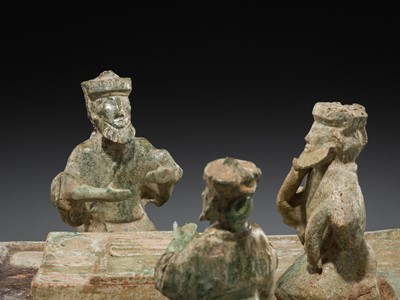 Lot 230 - AN EXCEEDINGLY RARE POTTERY GROUP OF FOREIGN LIUBO PLAYERS, EASTERN HAN DYNASTY