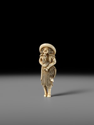 AN IVORY NETSUKE OF A DUTCHMAN WITH COCKEREL