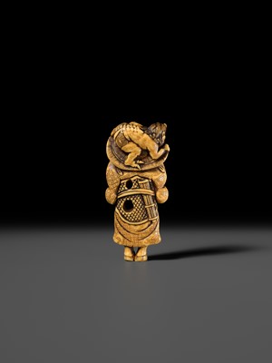Lot 126 - A POWERFUL KYOTO SCHOOL IVORY NETSUKE OF SHOKI AND ONI