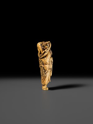 Lot 126 - A POWERFUL KYOTO SCHOOL IVORY NETSUKE OF SHOKI AND ONI