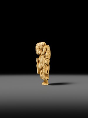 Lot 124 - OKATOMO: A FINE IVORY NETSUKE OF HOTEI WITH A KARAKO