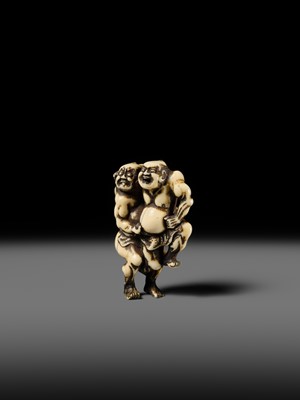 Lot 130 - AN IVORY NETSUKE OF THE TWO SUMO WRESTLERS KAGEHISA AND SUKEYASU